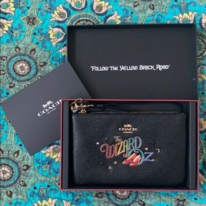 Coach Wizard of Oz leather wristlet.  Brand new.